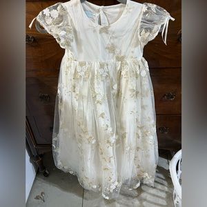 Girls size 7 flower girl / holiday dress. Ivory color with gold stitching.